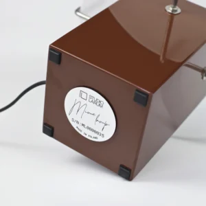 a brown box with a black wire